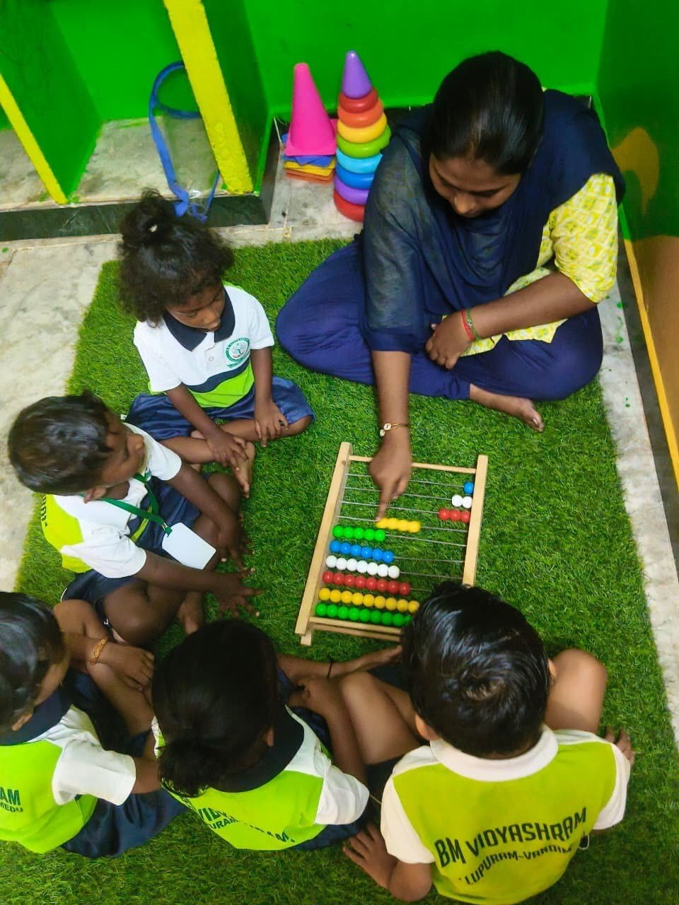 Abacus counting lesson in the activity room